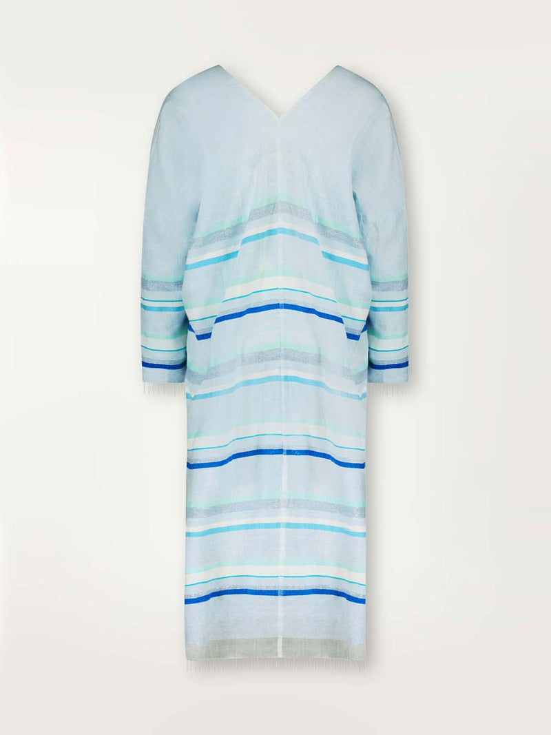 Product shot of the back the Ruki Long Sleeve Split Caftan featuring a mutli tonal stripe pattern in five shades of blue with silver and white accents.