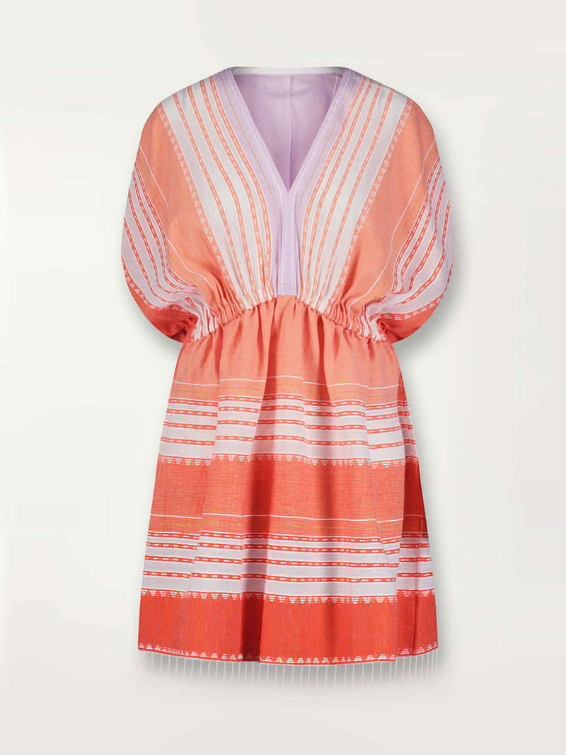 Product shot of the Eshal Short Plunge Neck Dress featuring white doted stripes with gradiant orange and tangerine bands on a lilac and white background.