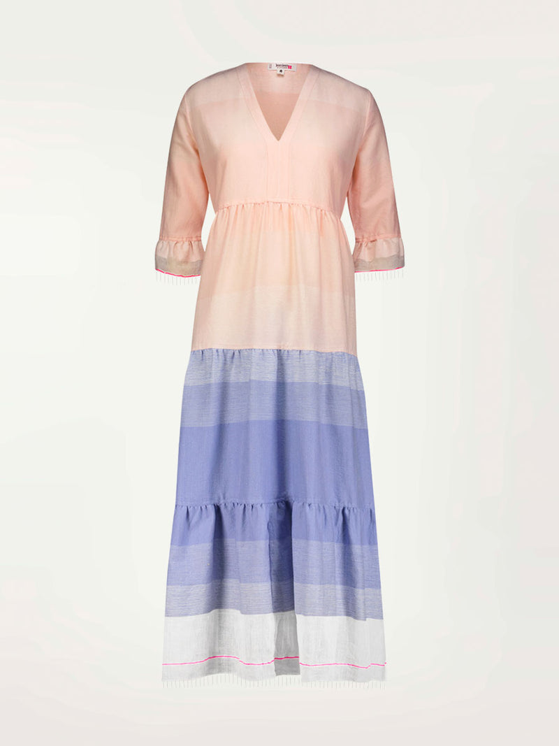 Product shot of the Jelba Long Flutter Dress featuring gradient color block design of nine shades of soft pink and blues highlighted by a bright pink mini stripe at the edge of the dress.