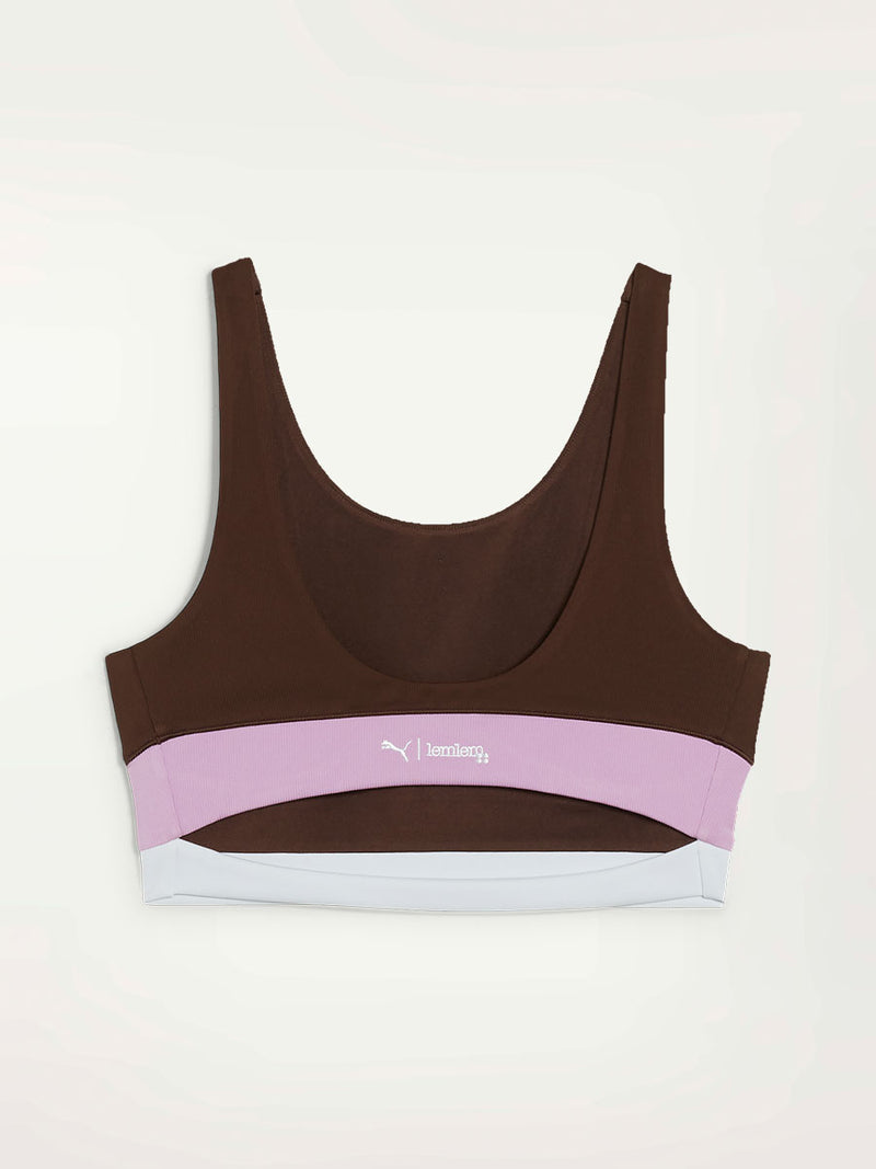 Product Back Shot of Puma x lemlem Crop Tank Featuring Dark Chocolate Color and Color Block Details on the Under Band in Violet and White colors