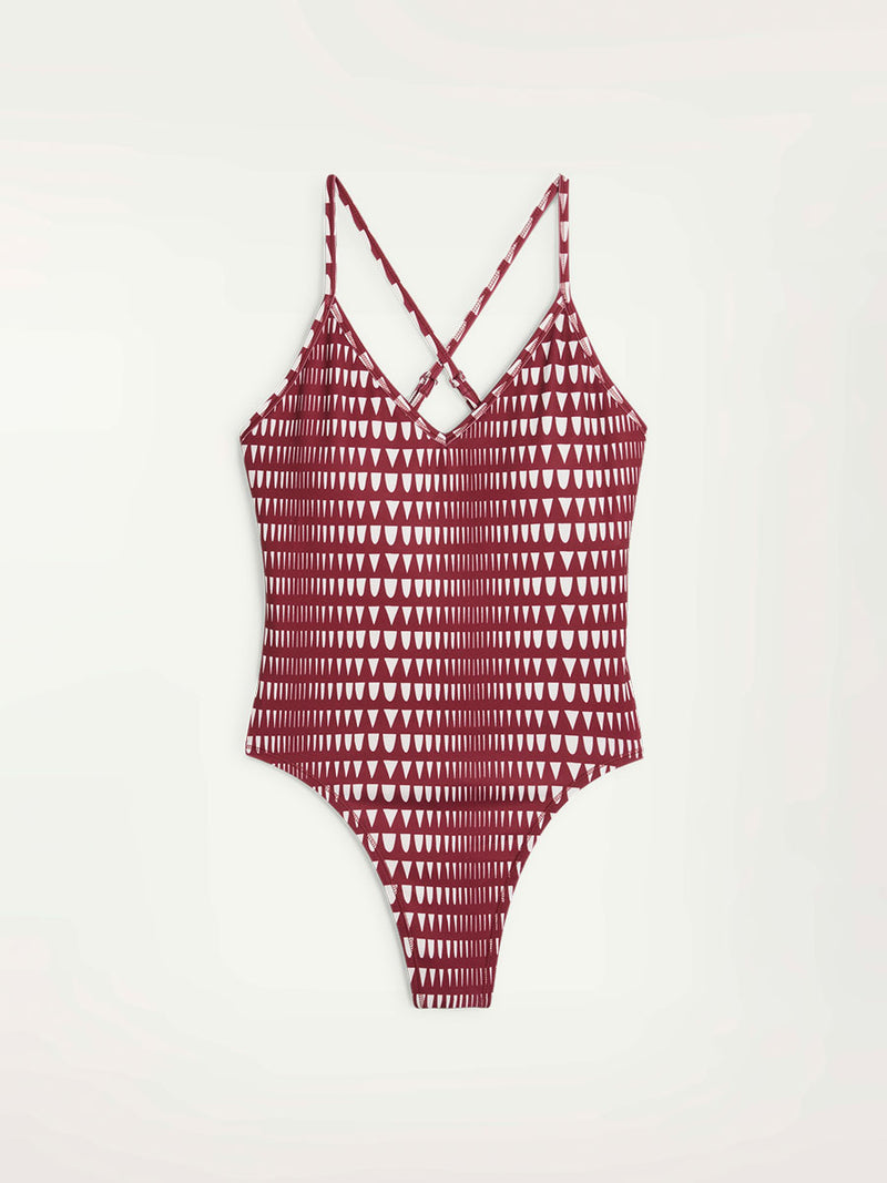 Product Front Shot of the Leotard in Team Regal Red Color Featuring lemlem Triangle Pattern in White color