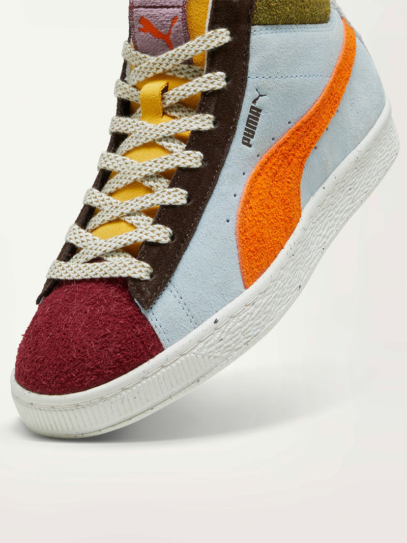 Product Сlose Up Side Shot of Puma x lemlem Suede Sneakers in Icy Blue Color featuring Color Accents in Olive, Red and Cayenne Pepper Colors