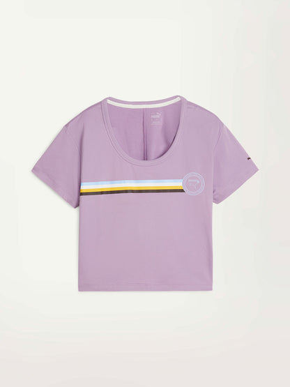 Product Front Shot of Puma x lemlem Tee in Vivid Violet Color featuring color stripe detail on the  front