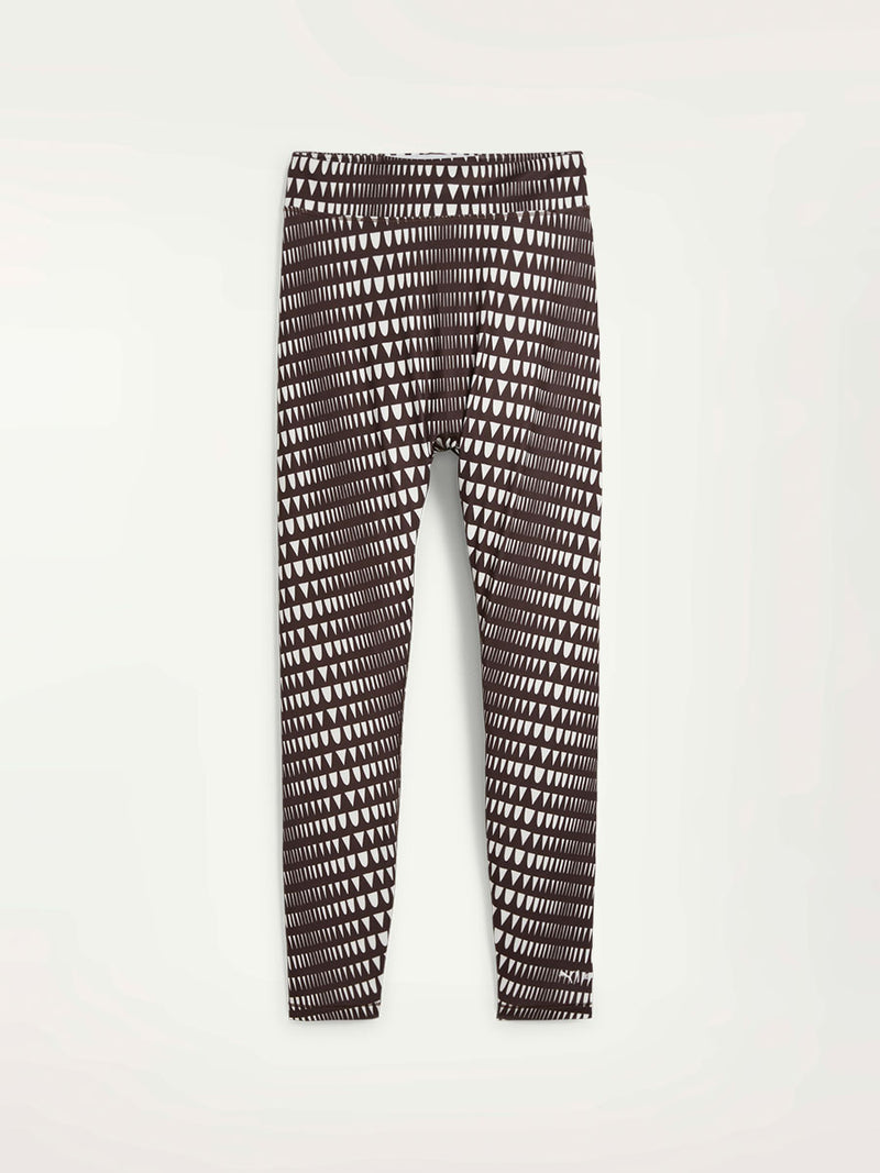 Product Front Shot of Puma x lemlem Leggings in Dark Chocolate Color featuring lemlem triangle pattern in white color