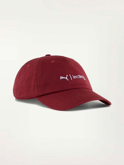 Product Font Shot of lemlem x Puma Cap featuring Team Regal Red Color and Puma x lemlem Logo on the front