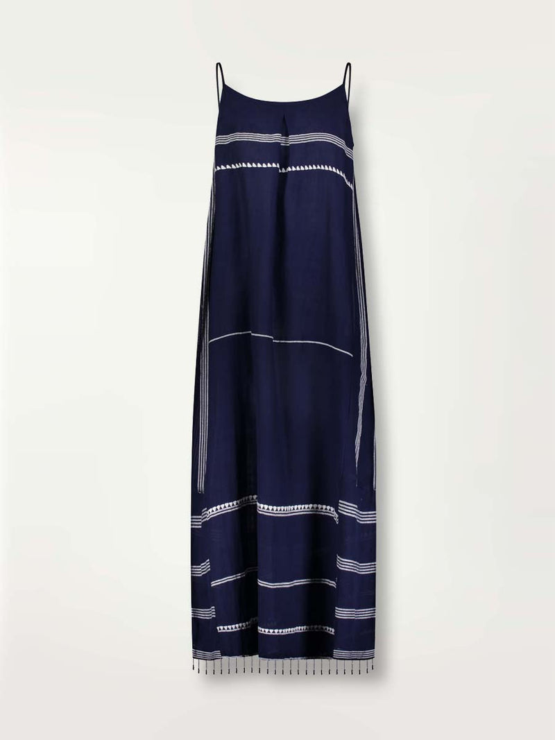 Product shot of the front of the Nunu Long Slip Dress in navy blue featuring white stripes and graphic lines.