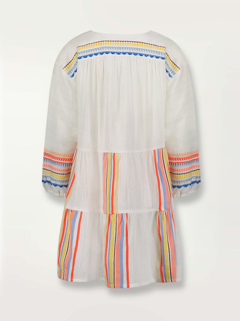 Product shot of the back the Bekah Popover Dress featuring 10 tutti frutti colors embroidered on a white background.  