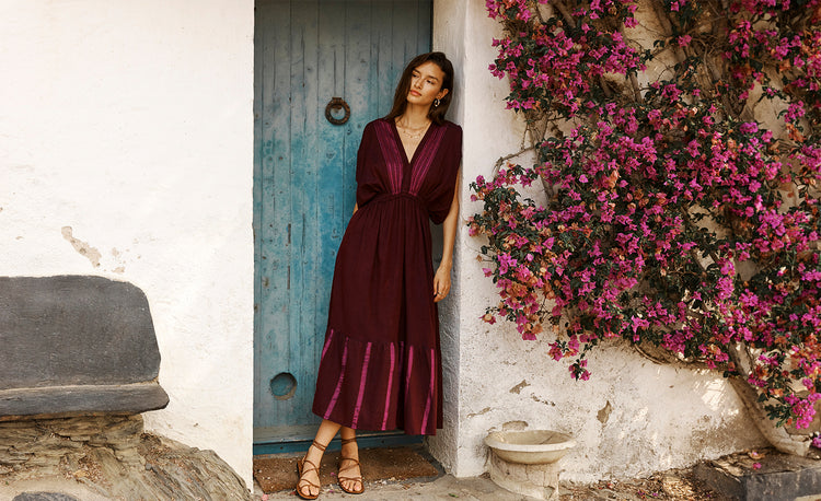 Woman Standing Wearing Jordanos Burgundy Plunge Neck dress