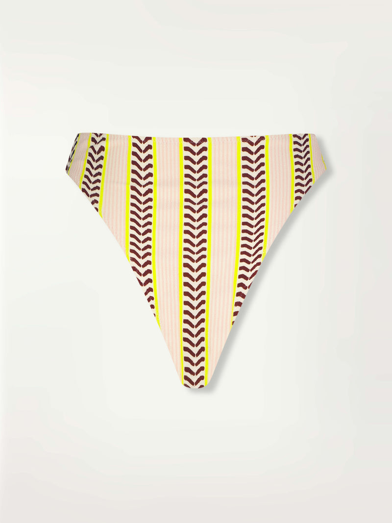 Product Back Shot of a Kala High Leg Bikini Bottom featuring delicate pink stripes with a bold chevron patterned ribbon, along with muted hues of pink, burgundy, and a bright citrus hue.