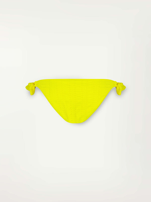 Product Front Shot of Lucy Side Tie Bottom featuring a textured down sampled Jordanos pattern in a bright flattering citron color