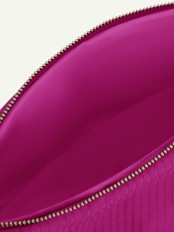 Product Close up Shot of lemlem Pouch featuring rich bright magenta color