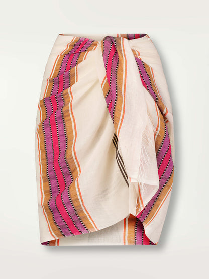 Product Front Shot of Lema Sarong featuring stripe pattern in magenta, ochre, and berry tones, delineated by black and white dots and accented with a splash of neon orange on natural cotton background
