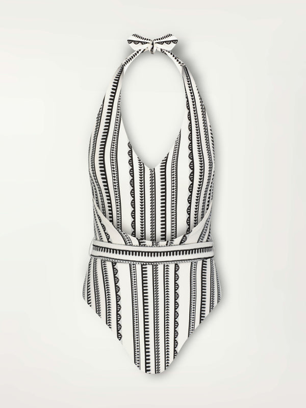 Product Back Shot of a Lidya Deep V One Piece featuring intricate black Tibeb bands on a textured white background.