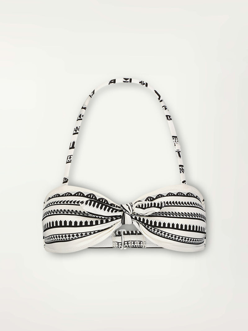 Product Front Shot of Ava Bandeau Bikini Top featuring intricate black Tibeb bands on a textured  white background.