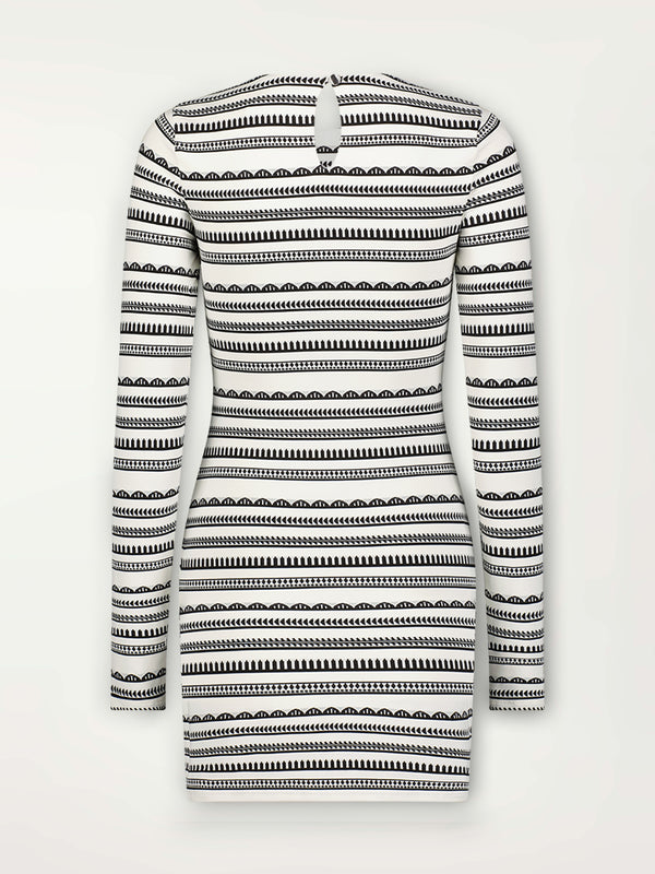 Product Back Shot of a Nyala Swim Dress featuring intricate black Tibeb bands on a textured white background.