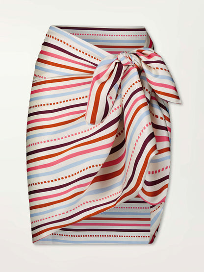 Product Front Shot of Adia Sarong featuring multi stripe pattern with geometric dots with Coral, Sky blue colors grounded by brown ground color on cream background.
