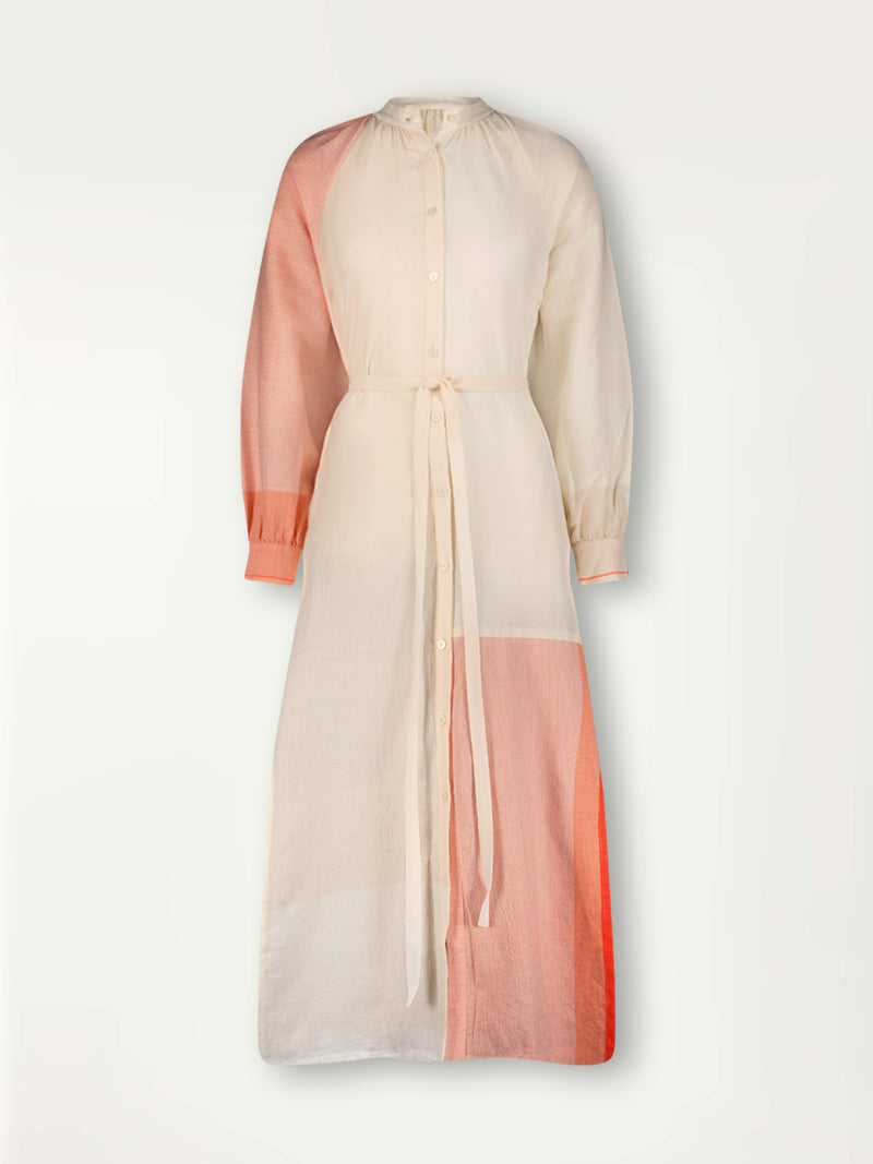 Product Front Shot of Makeda Button Up Dress Featuring asymmetric color block details in tan and blush colors highlighted with bright orange on the soft cream background.