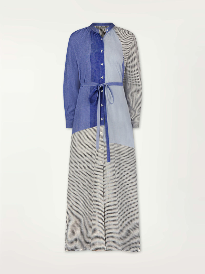 Product Front Shot of Makeda Button Up Dress Featuring textural dot pattern that contrasts the asymmetrical color-blocking of denim blues.