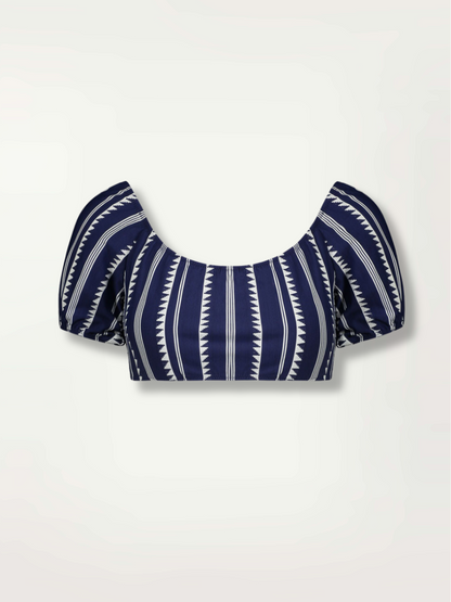 Product shot navy Nunu pouf swim top with white triangles and stripes
