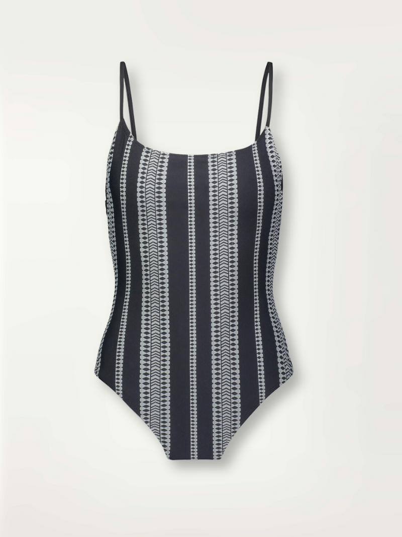 product shot of the Luchia Classic one piece swimsuit in black with white graphic diamond and arrows