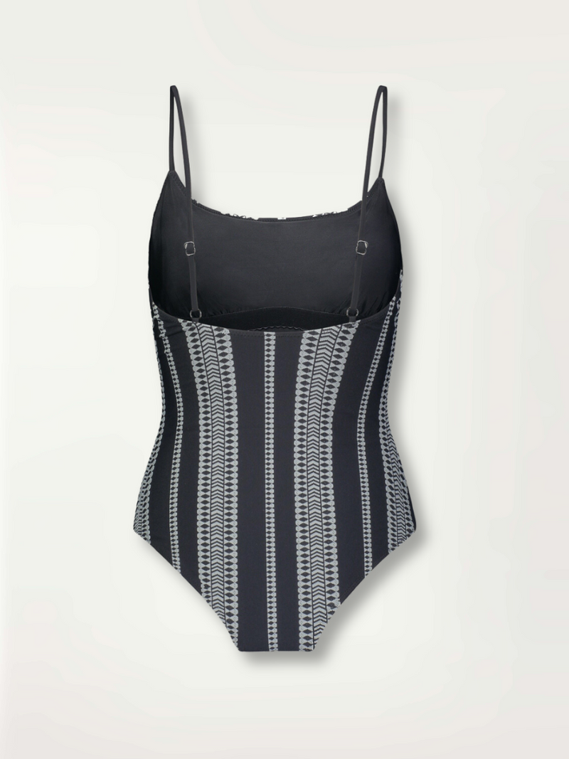 product shot of the back of the Luchia Classic one piece swimsuit in black with white graphic diamond and arrows