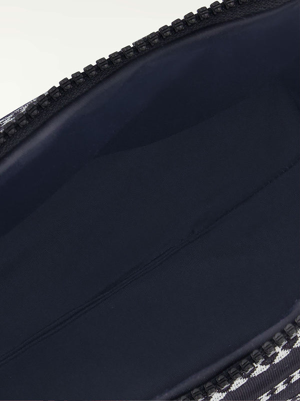 Close-up of a black pouch with a zipper
