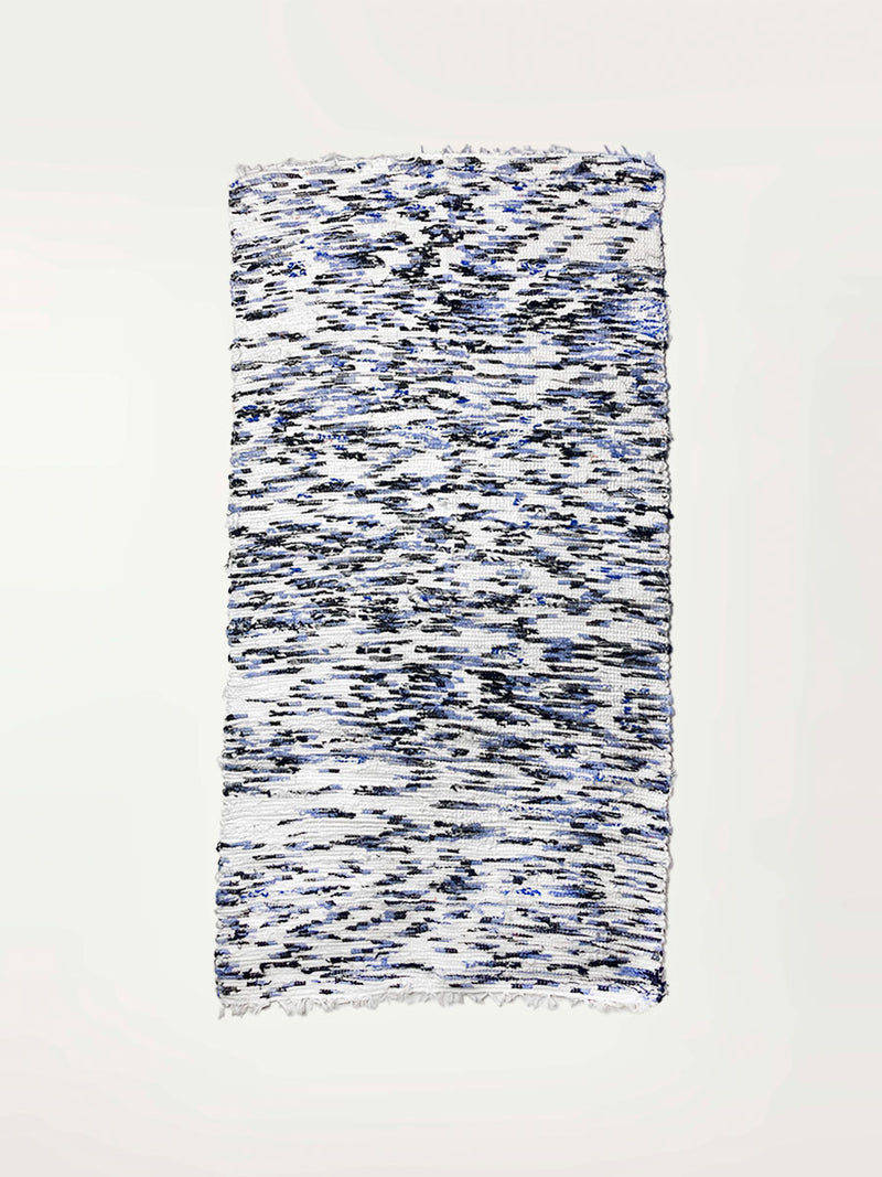 Produc Shot of a Rug Featuring White, Blue and Black Colors