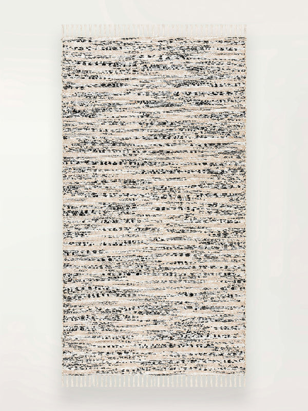 Product shot of lemlem upcycled handwoven MESFIN Rug with multicolored patterns