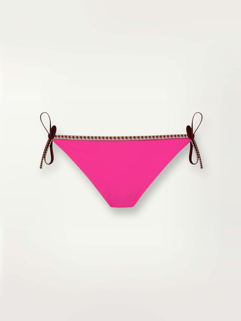 Product shot of the Lena String Bikini Bottom in bright neon pink with a bordeaux diamond trim.
