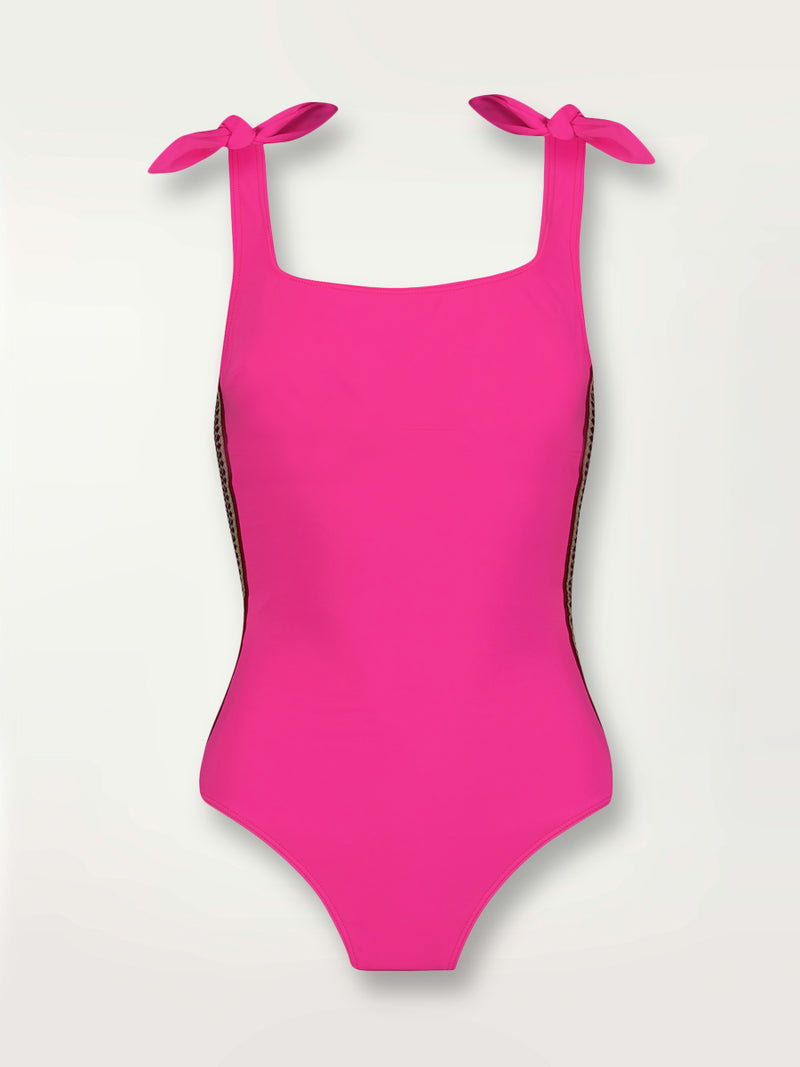 Product shot of the Lena Nageur One Piece in bright neon pink with a bordeaux diamond trim.