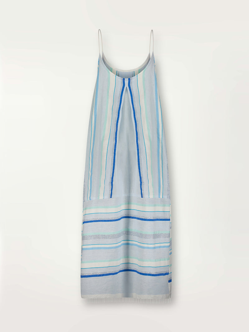 Product shot of the back the Ruki Slip Dress featuring a mutli tonal stripe pattern in five shades of blue with silver and white accents.