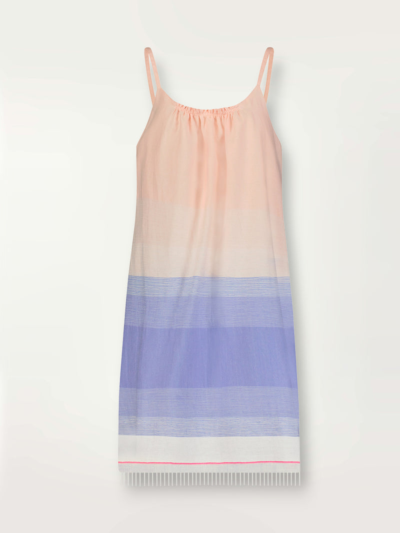 Product shot of the Jelba Swing Dress featuring gradient color block design of nine shades of soft pink and blues highlighted by a bright pink mini stripe at the edge of the dress.