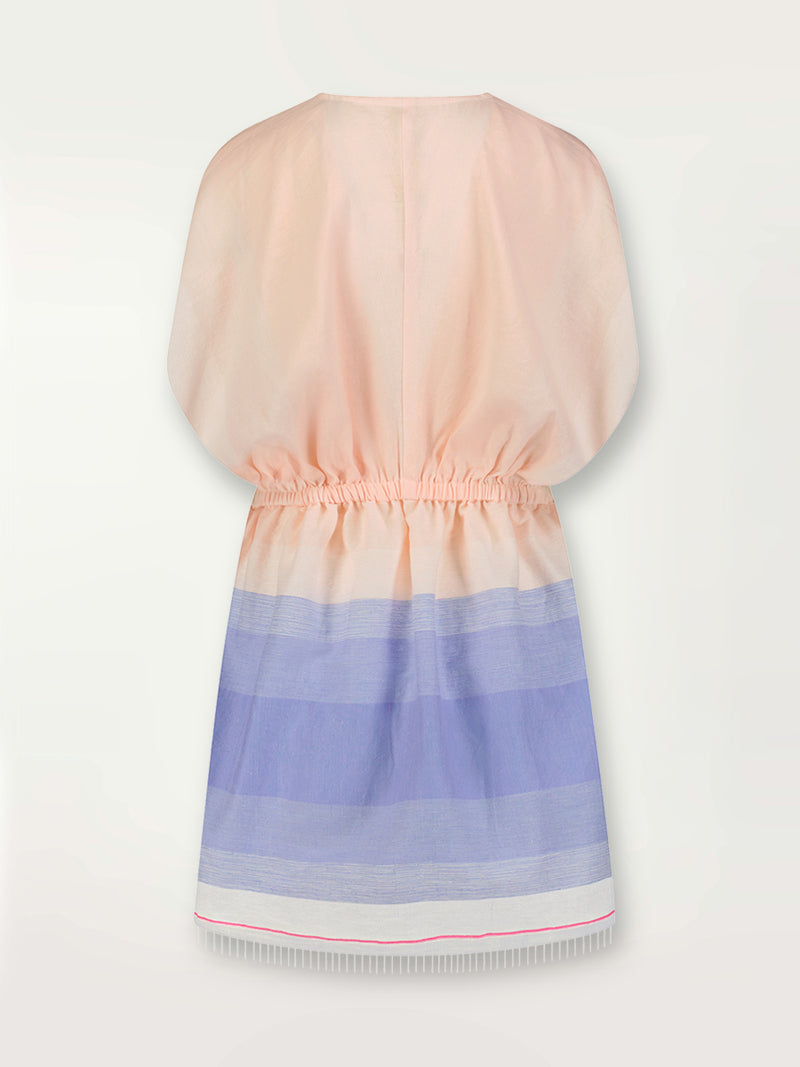 Product shot of the back the Jelba Short Plunge Neck Dress featuring gradient color block design of nine shades of soft pink and blues highlighted by a bright pink mini stripe at the edge of the dress.