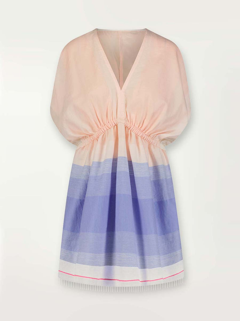 Product shot of the Jelba Short Plunge Neck Dress featuring gradient color block design of nine shades of soft pink and blues highlighted by a bright pink mini stripe at the edge of the dress.