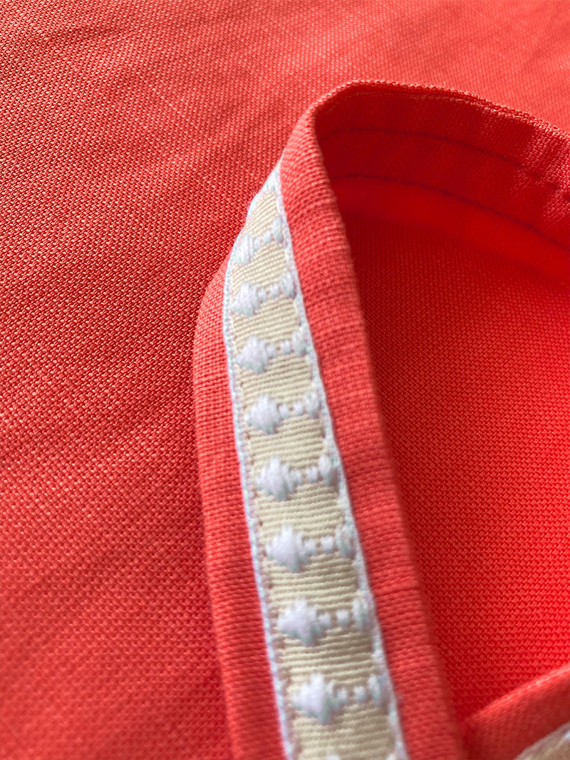 Close up on Linen Tencel fabric of Meaza Button Up coral color