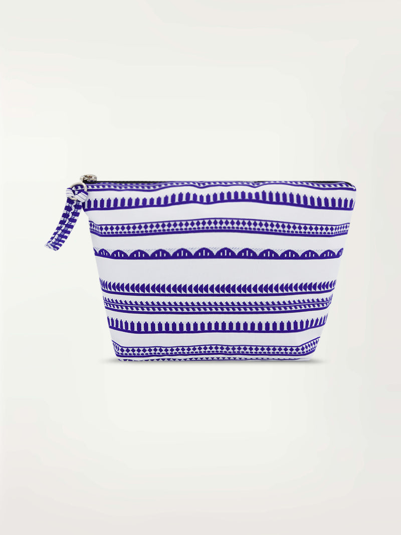 Product picture of a white travel pouch featuring horizontal geometric blue stripes and a black zip closure at the top.