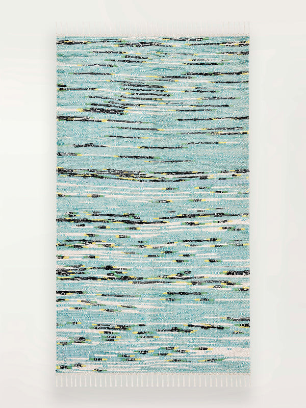Textured area lemlem upcycled MESFIN  rug with a pattern of horizontal lines on a white background