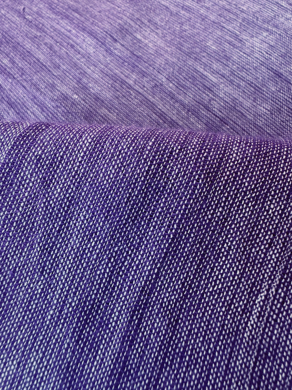 Close up on lemlem nefas plum fabric  featuring  rich plum color