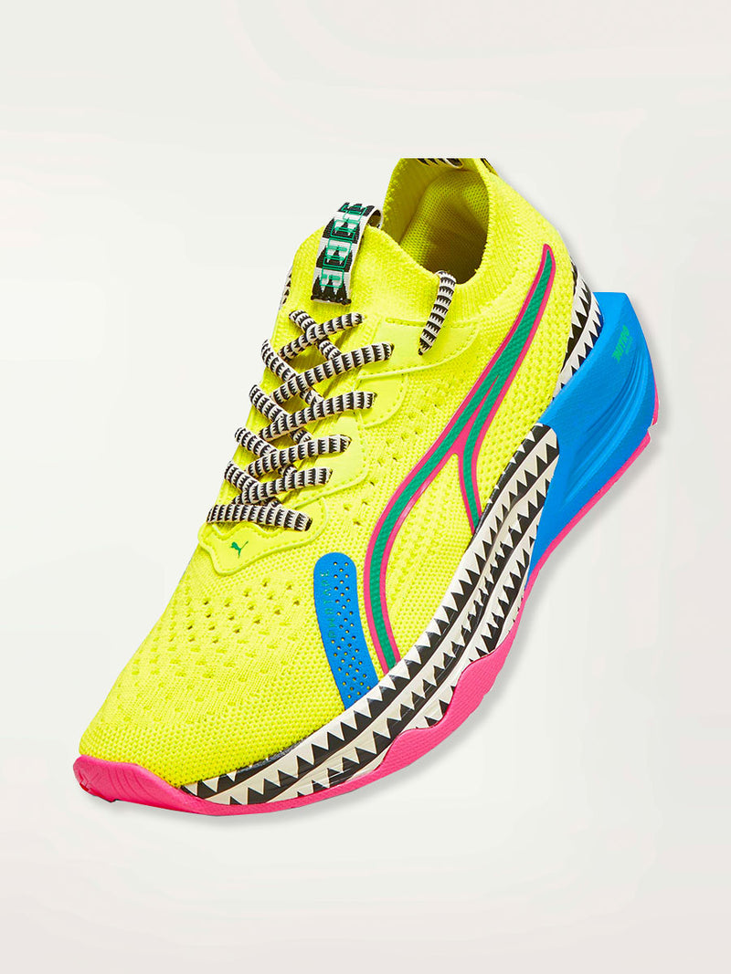 Product Shot of a Puma PWR XX NITRO™ Women's Training Shoe featuring a premium knitted upper highlighted with bright color details and lemlem’s traditional triangle print.