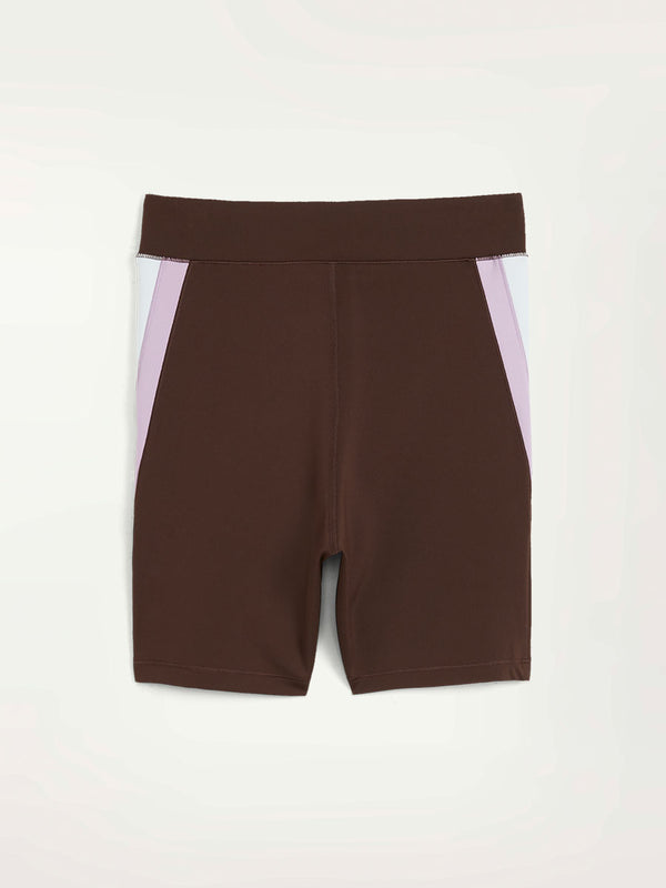 Product Back Shot of Puma x lemlem Biker Shorts Featuring Dark Chocolate Color and color block details on hips in Violet and WhiteColors