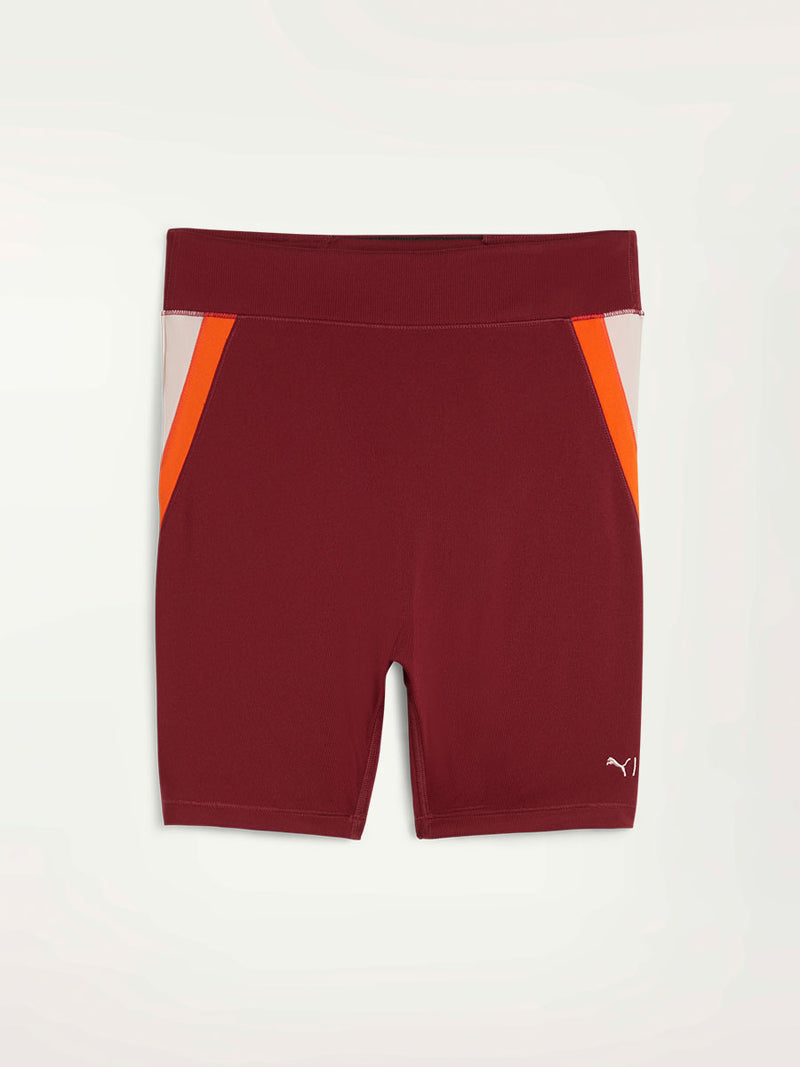 Product Front Shot of Puma x lemlem Biker Shorts Featuring Team Regal Red Color and color block details on hips in Warm White and Cayenne Pepper Colors