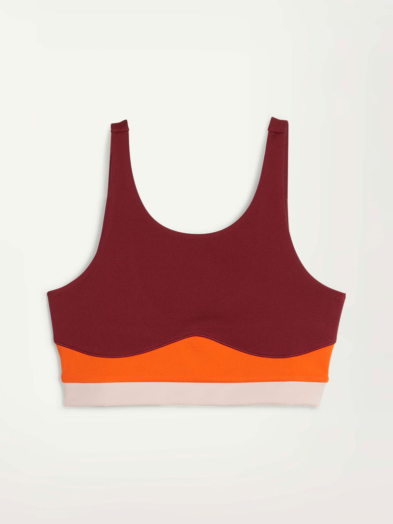 Product Front Shot of Puma x lemlem Crop Tank Featuring Team Regal Red Color and Color Block Details on the Under Band in Orange and White colors