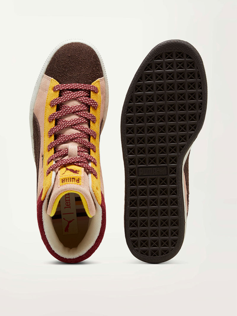 Product Shot of Puma x lemlem Suede Sneakers Featuring Color Accents in Dark Chocolate and Red Colors