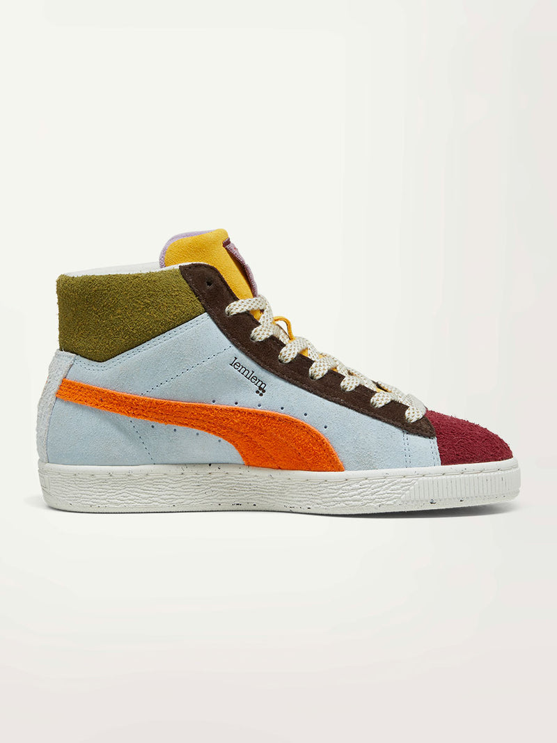 Product Side Shot of Puma x lemlem Suede Sneakers in Icy Blue Color featuring Color Accents in Olive, Red and Cayenne Pepper Colors