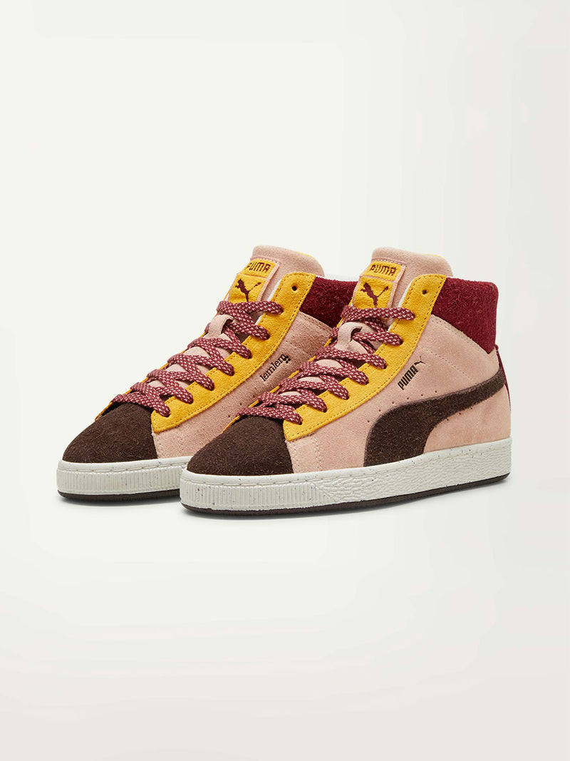 Product Shot of Puma x lemlem Suede Sneakers Featuring Color Accents in Dark Chocolate and Red Colors
