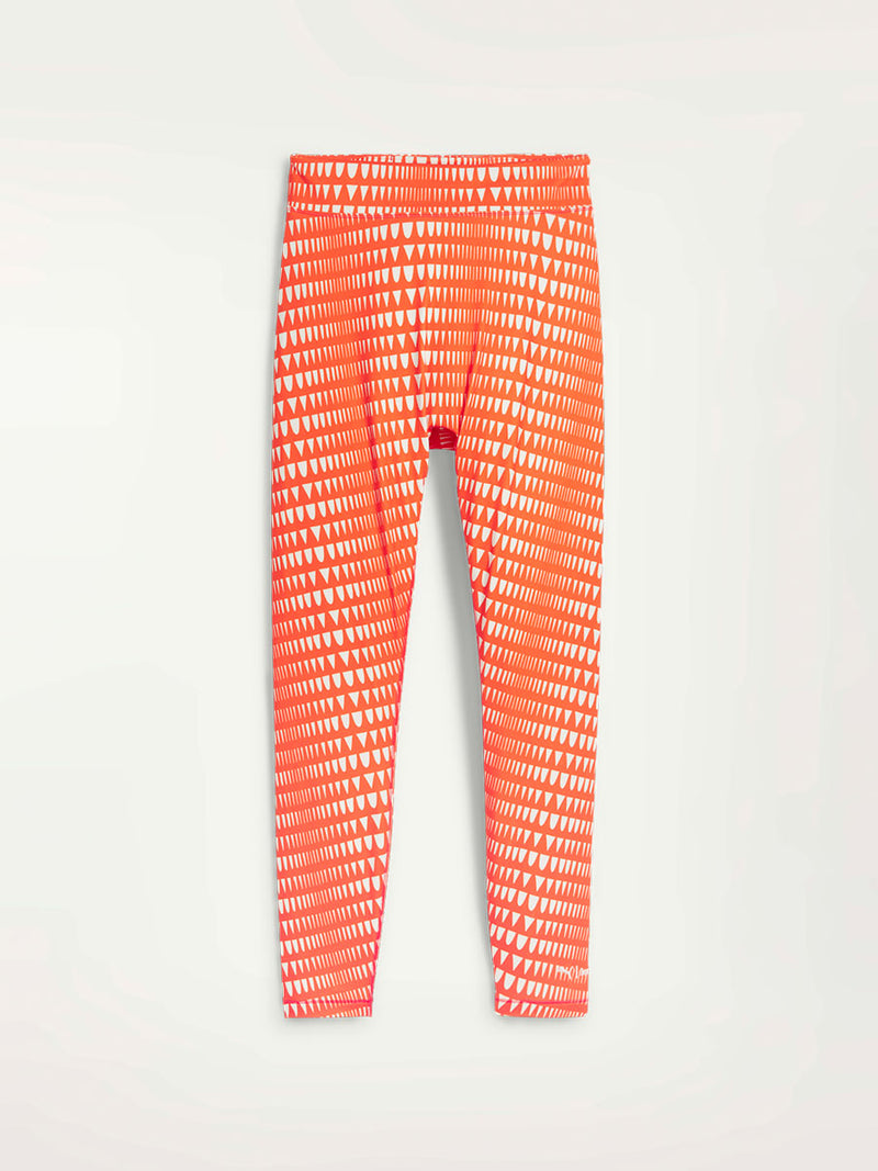 Product Front Shot of Puma x lemlem Leggings in Team Regal Red Color featuring lemlem triangle pattern in white color