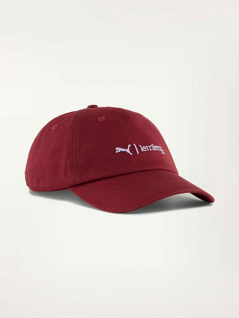 Product Font Shot of lemlem x Puma Cap featuring Team Regal Red Color and Puma x lemlem Logo on the front