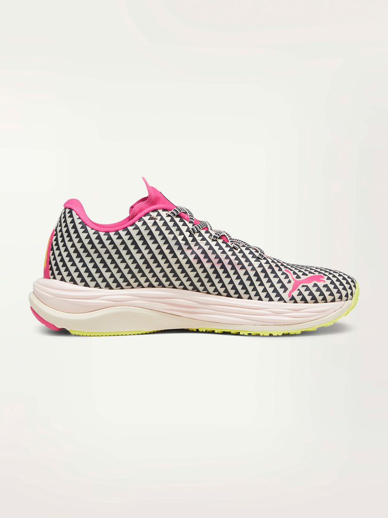 Product side Shot of a Puma x lemlem Velocity Sneakers featuring signature lemlem Tibeb print, frosty pink, puma black, bright pink and yellow burst colors