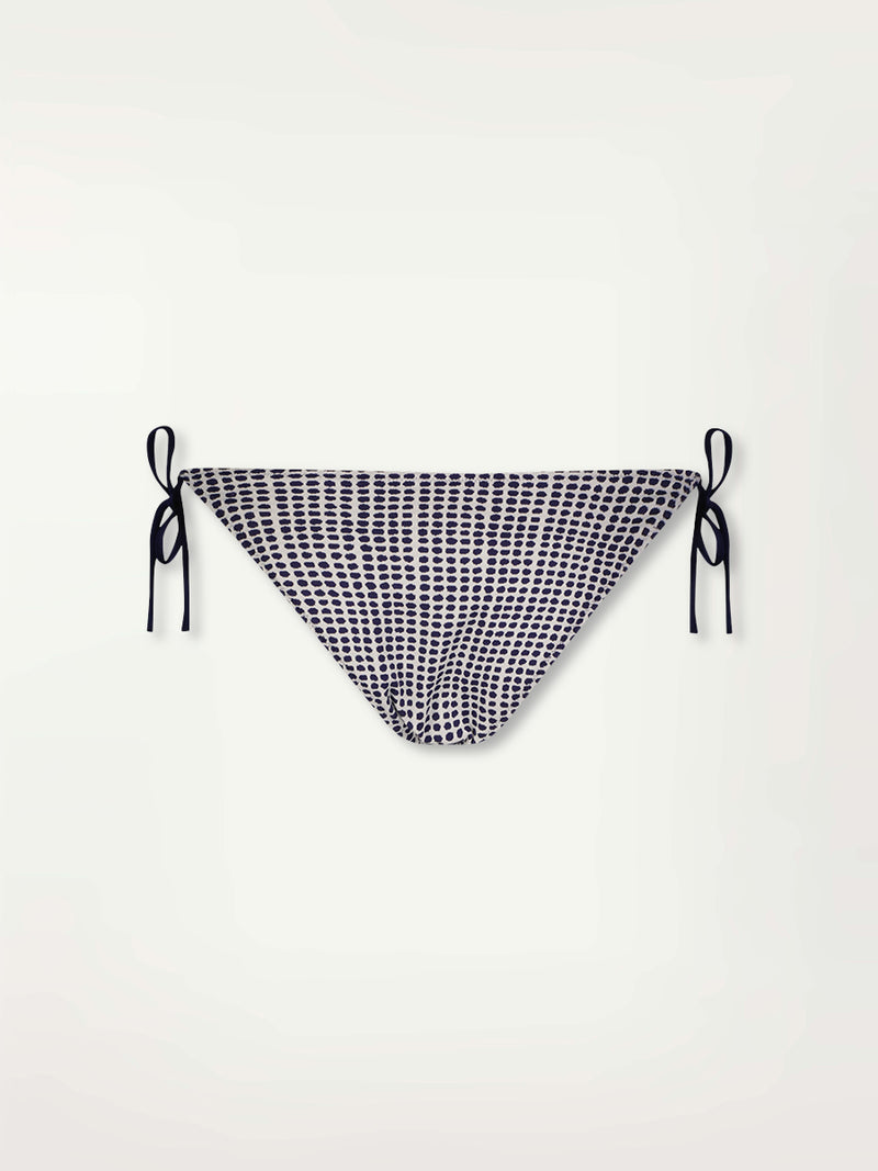 Product Back Shot of the Rekka String Bikini Bottom Featuring Blue Dotted Pattern