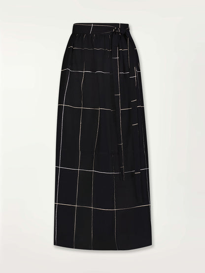 Product Front Shot of the Tola Maxi Skirt featuring Big White Plaid Patten on Black Cotton Background